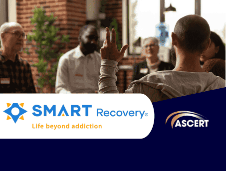 SMART Recovery A group of people sit around in a circle for a SMART Recovery meeting.